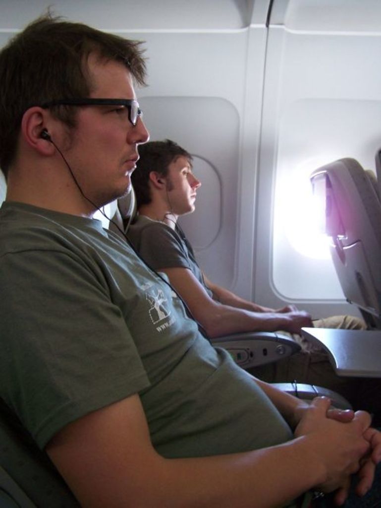 Fig. 2: Thomas Kabs and Will Kennedy concentrating during the flight to Amman (photo: S. Hoffmann)