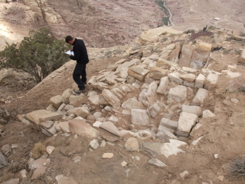 Fig. 22: Stephan Schmid standing on the supposed toilet, drawing the huge debris in it.