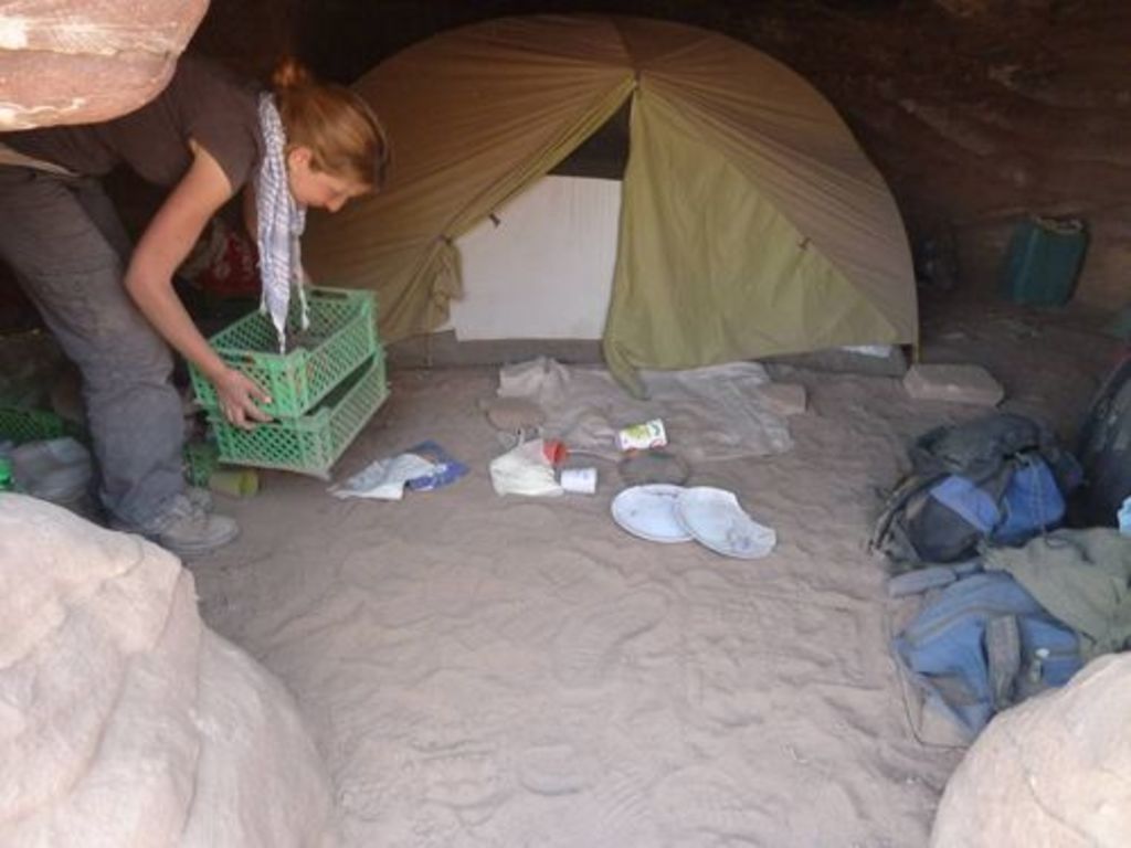 Fig. 72: Lydia Kappa cleaning up the devastated cave.