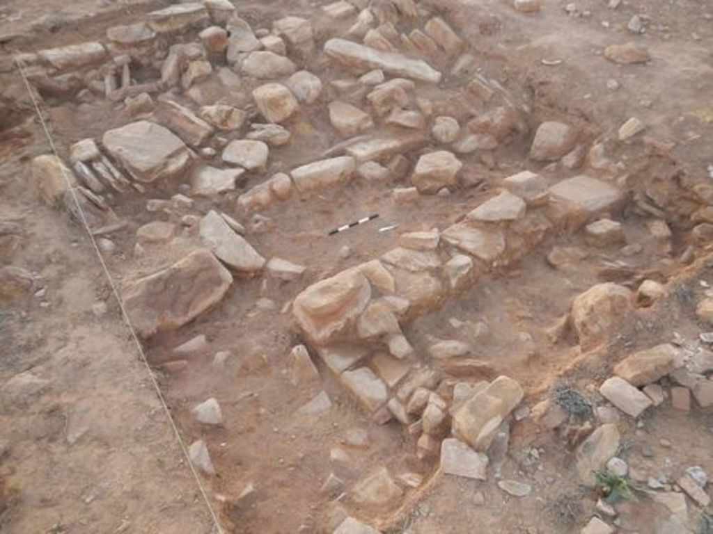 Fig. 11: One of the trenches after the first level has been excavated. Walls already start appearing