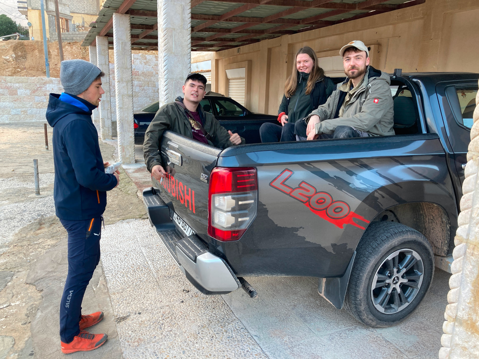 Fig. 7: Maximilian Arnold, Ernst Tolksdorff, Josephine Klatt and Niklas Jungmann sitting in the back of the pickup truck (photo: André Barmasse).