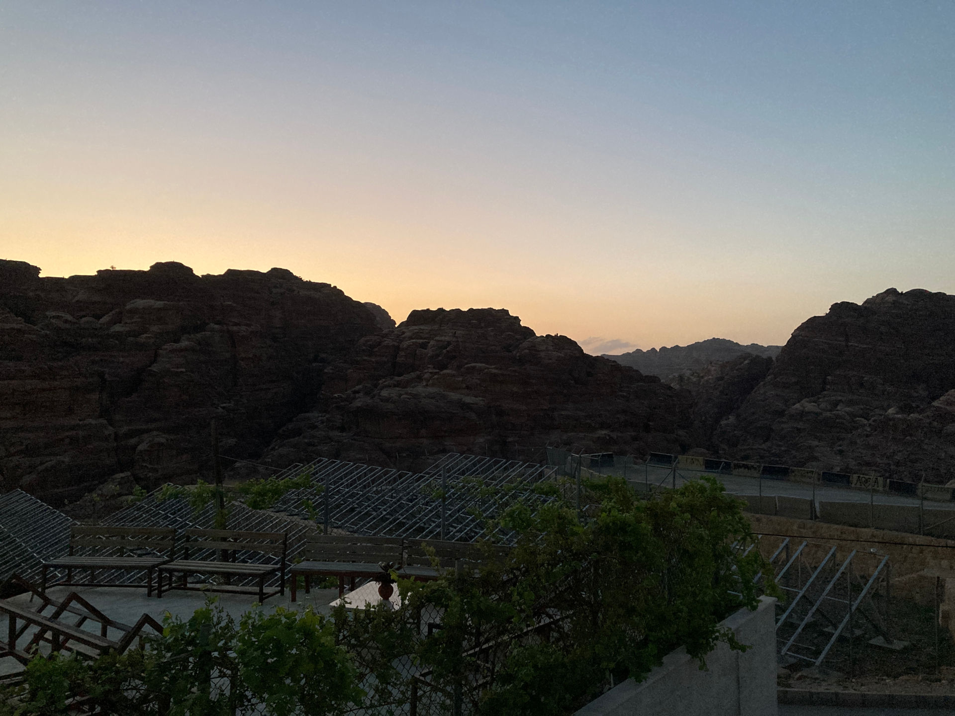 Fig. 56: The last sunset from Harun’s house with the broken solar energy park in front (photo: André Barmasse).